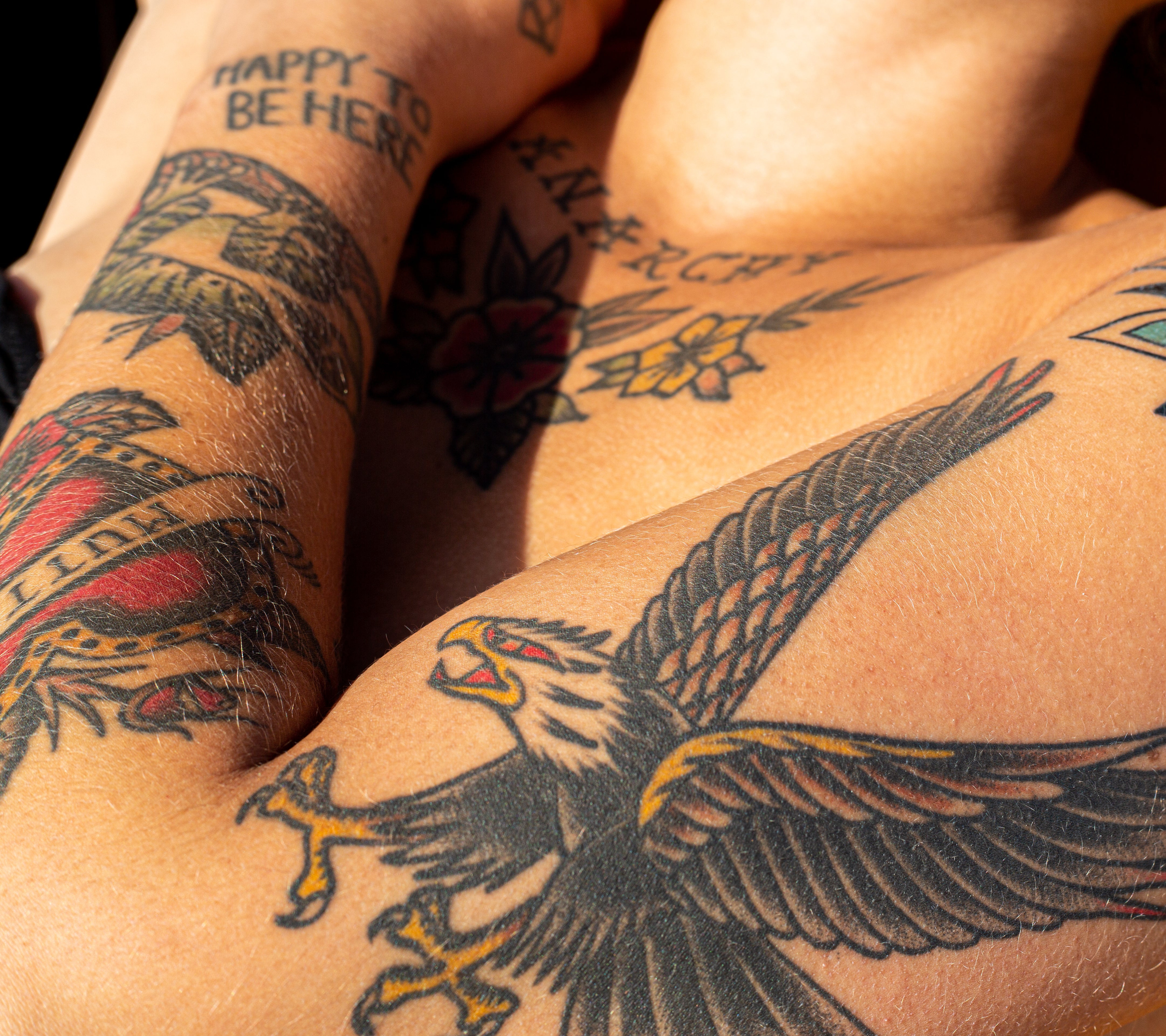 An example of a tattoo that has aged prematurely due to sun exposure
