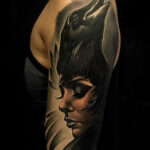 Woman Cleaning Arm Tattoo