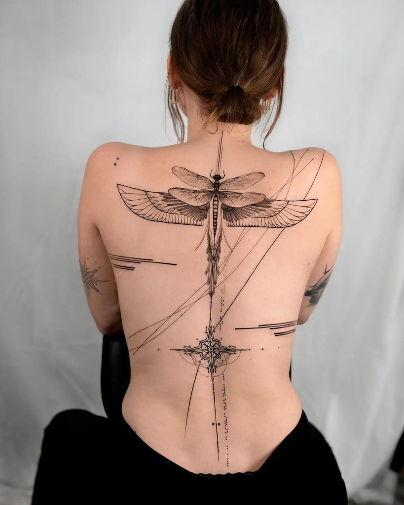 Back tattoo showing a detailed mandala design, representing harmony and balance
