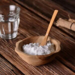Baking soda and water for tattoo ink stain removal from clothes