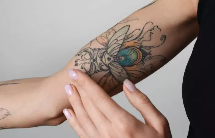 Inner bicep tattoo pain
