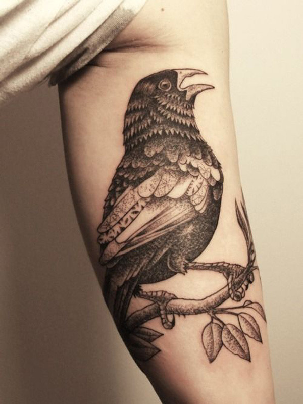 Traditional eagle bicep tattoo for men with bold outlines