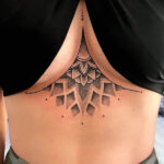 Black and grey mandala underboob tattoo by @joanie.psychedelia