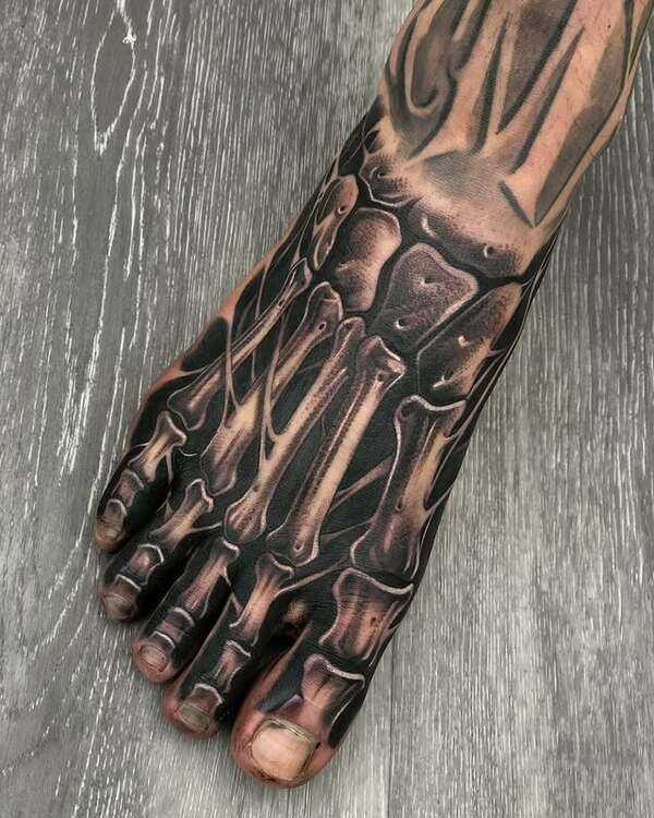 Masculine foot tattoo ideas
