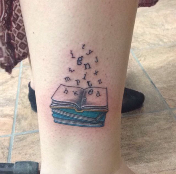 Unique open book tattoo design