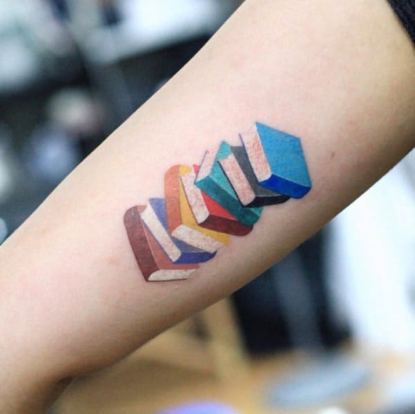Book tattoo with intense colors