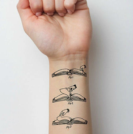 Fun book tattoo art