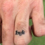 Bubba Watson's simple yet meaningful tattoo of his wife's name, "Angie," on his left ring finger, celebrated their tenth wedding anniversary with a permanent symbol of love and commitment