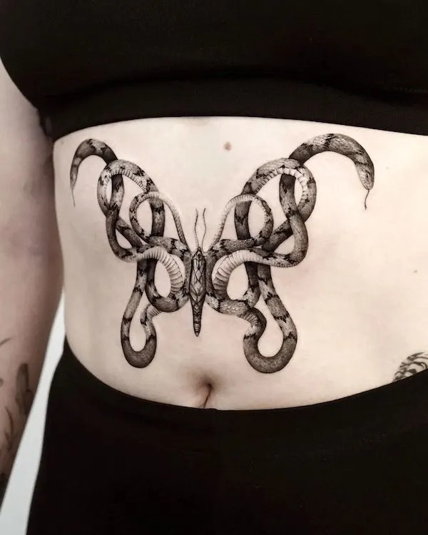 Moth snake sternum tattoo merging the beauty of moths with the allure of snakes.