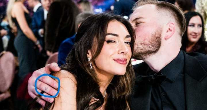 Zach Bryan at the GRAMMY Awards, showcasing his IQ tattoo.