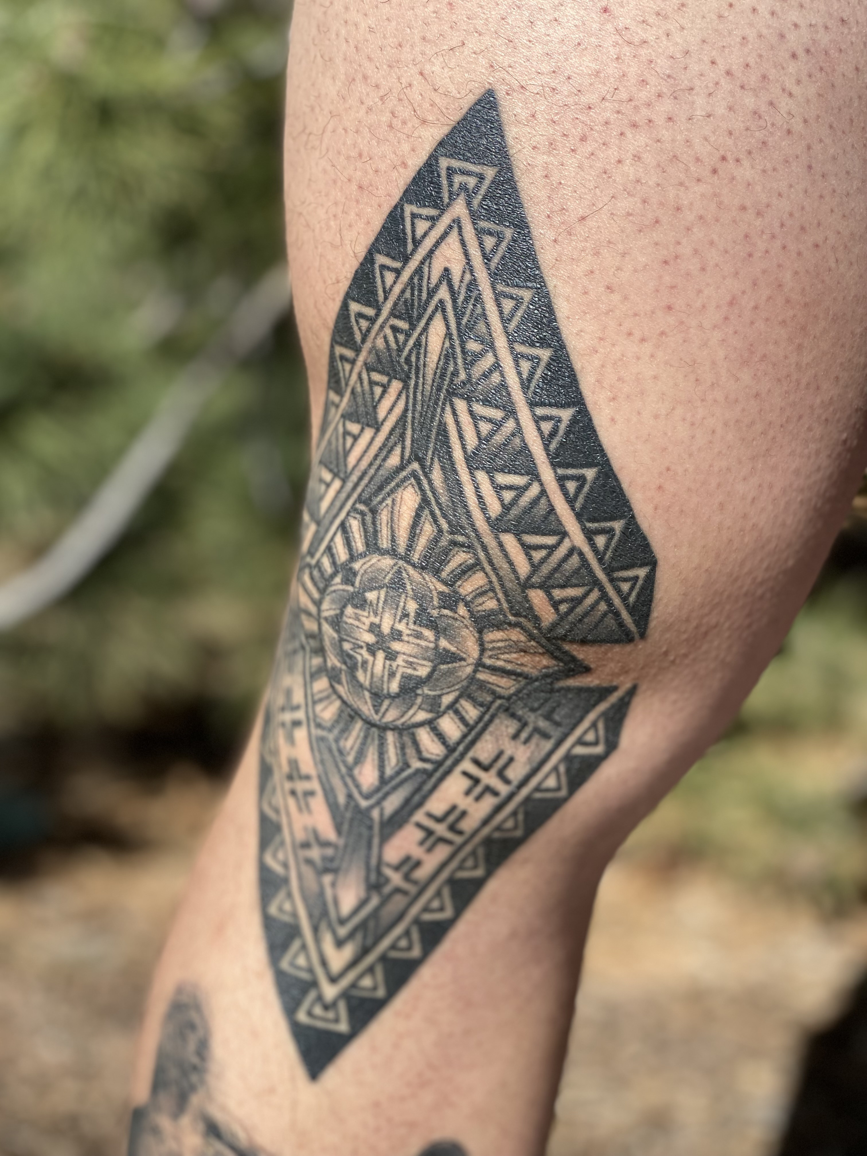 Tattoo depicting a caduceus with intertwined snakes, symbolizing medicine and healing, ideal for a physical therapist