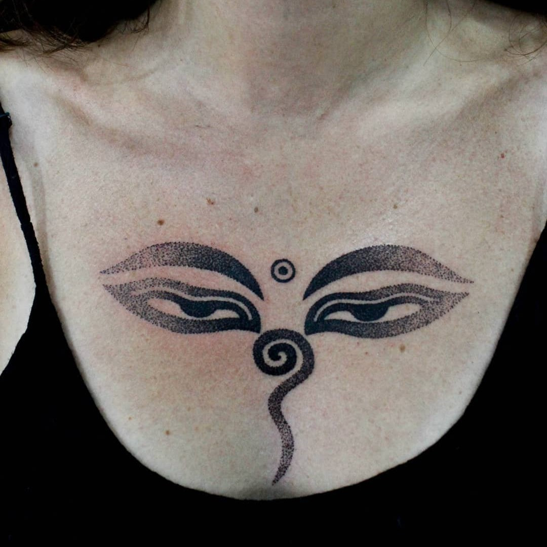 A set of Buddha eyes tattoos in black and white