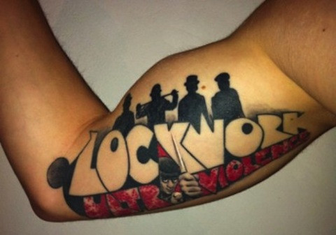 A Clockwork Orange tattoo featuring Alex's face on a forearm