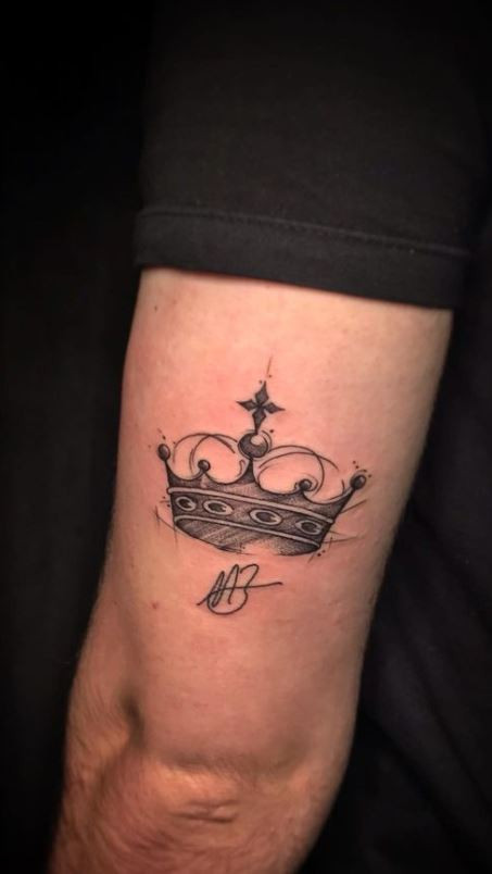 Crown Back of the Arm Tattoo