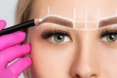 Custom eyebrow shaping enhances facial features