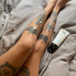 Freshly inked small tattoos on a woman's arm