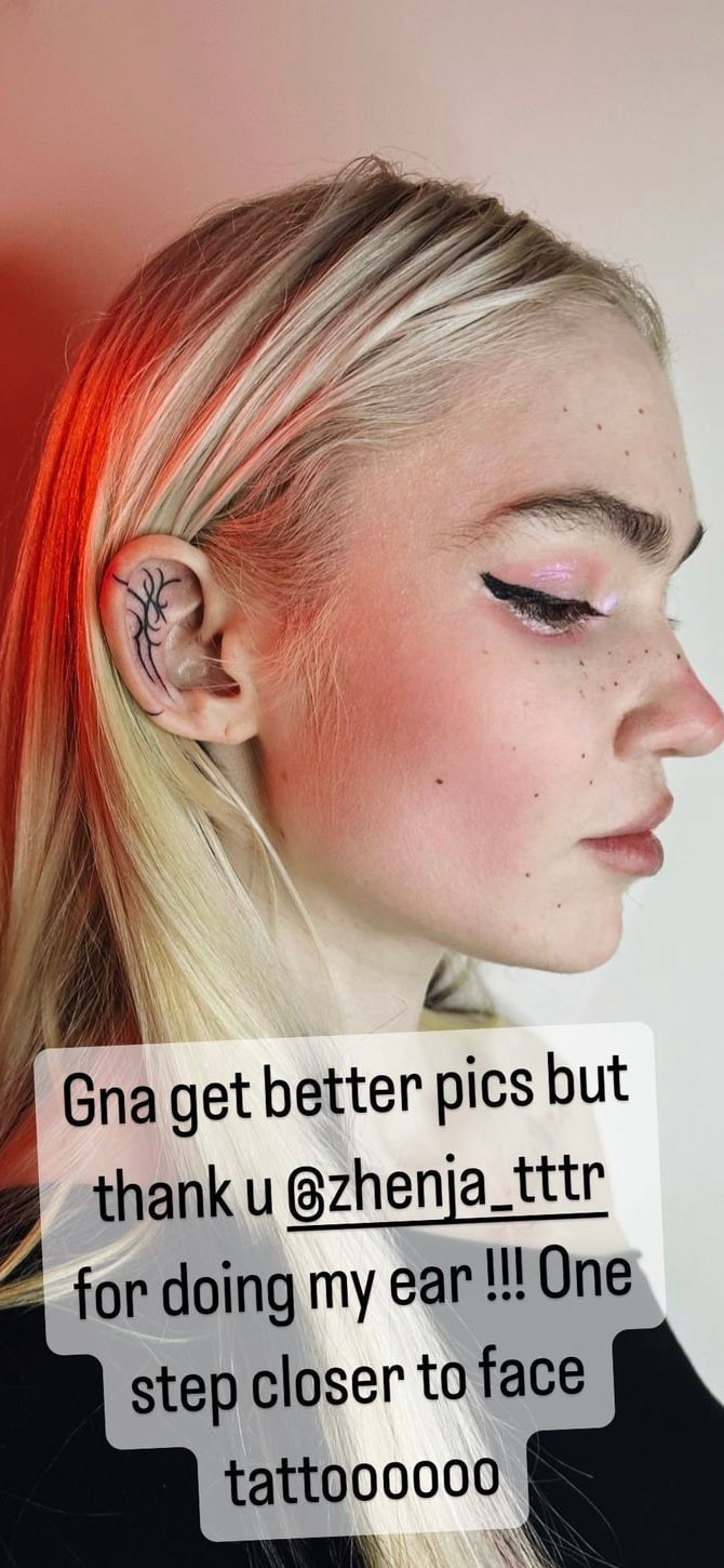 Grimes shared her face tattoo