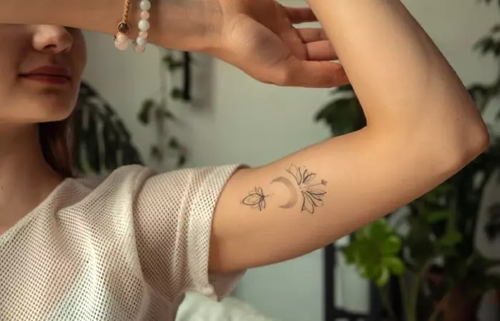 Coping with inner bicep tattoo pain
