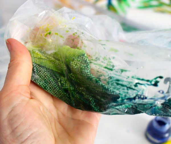 Scrunching fabric to distribute tattoo ink evenly