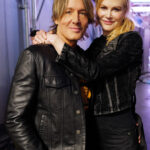 Keith Urban and Nicole Kidman at a benefit concert, showcasing their enduring bond.