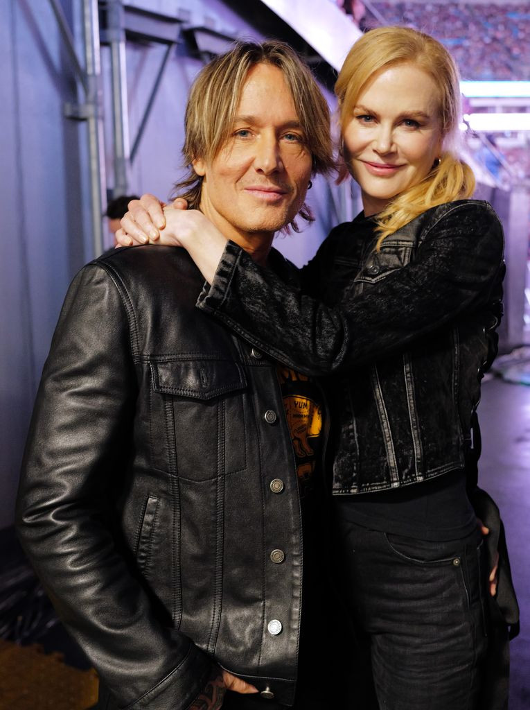 Keith Urban and Nicole Kidman at a benefit concert, showcasing their enduring bond.