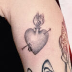 Ellie Cryer heart tattoo
