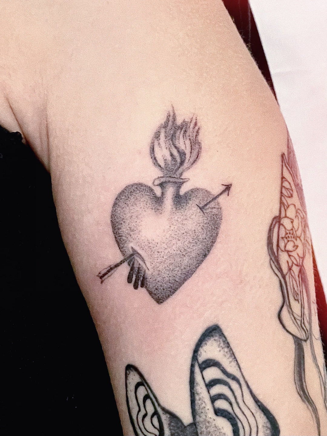 Ellie Cryer heart tattoo