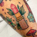 Tattoo with dark ink on freckled skin