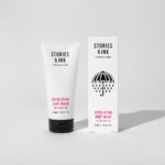 Exfoliating body wash for tattoo preparation