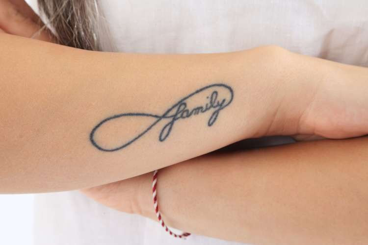 Family in infinity symbol tattoo