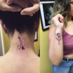 Small bow & arrow tattoo & rose tattoo - Artist: Breyner Alarcon - $100