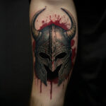 Historically inaccurate horned helmet tattoo