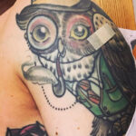 Author receiving influenza vaccination within a tattoo