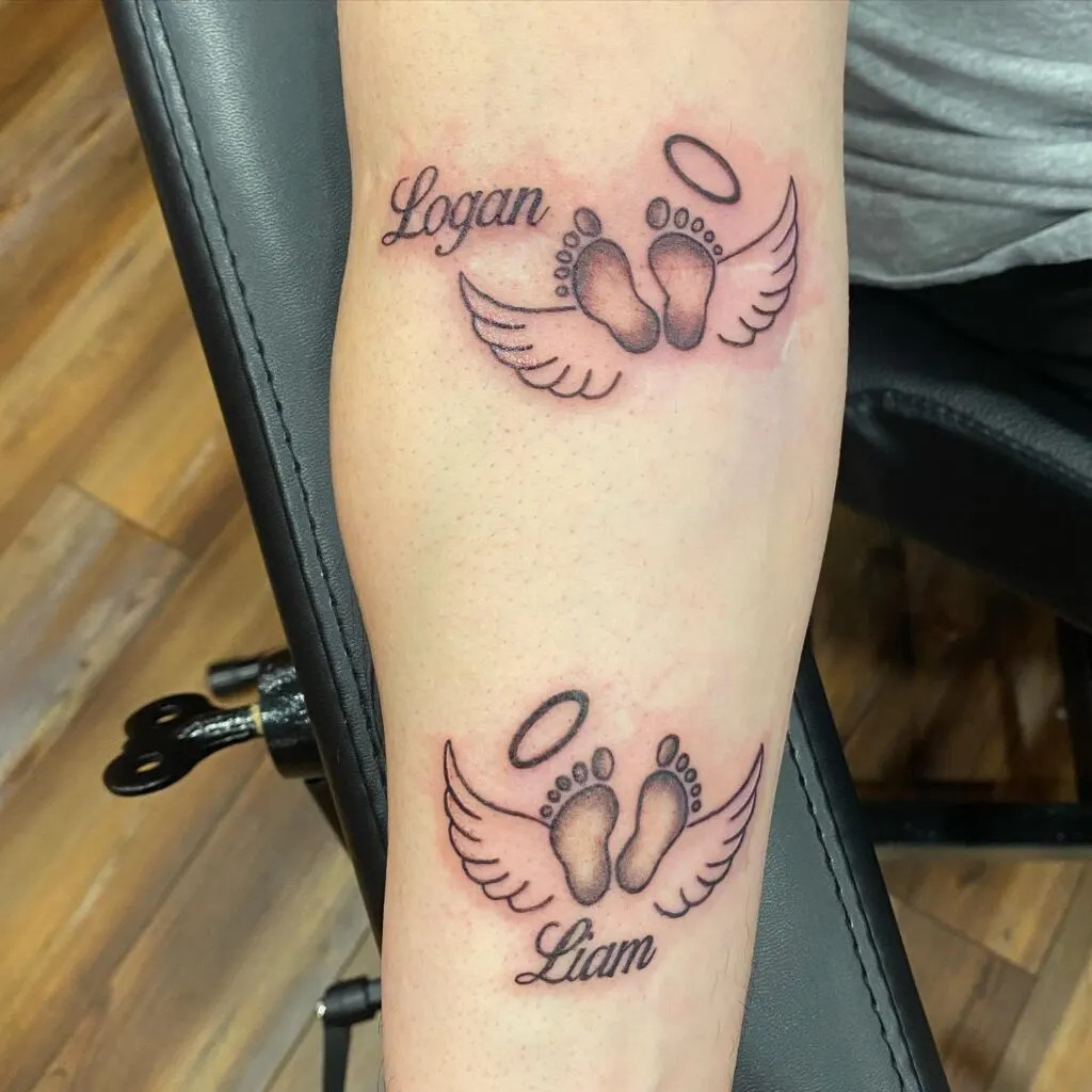 Angel wings and footprints tattoo with names, symbolizing guardian angels and paying tribute to cherished grandchildren who are no longer present