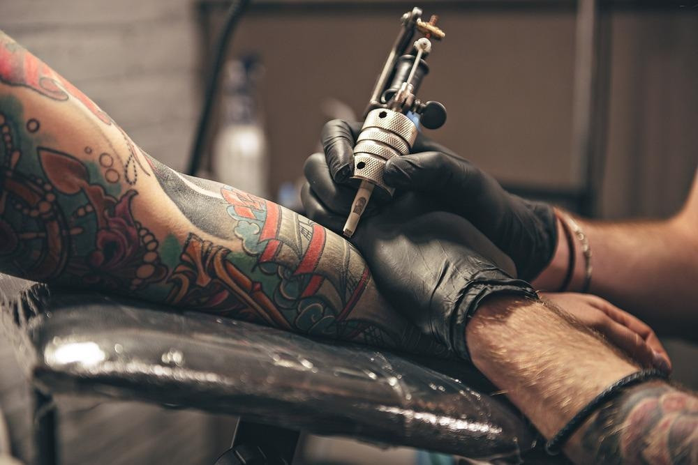 Close-up of tattoo ink being applied to skin