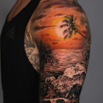 Tattoo artist working on a leg tattoo with intricate details