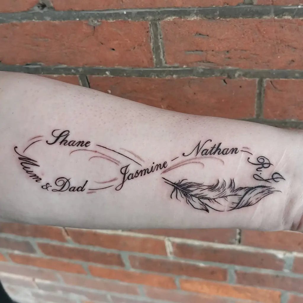 A floral infinity tattoo with delicate vines and blossoms