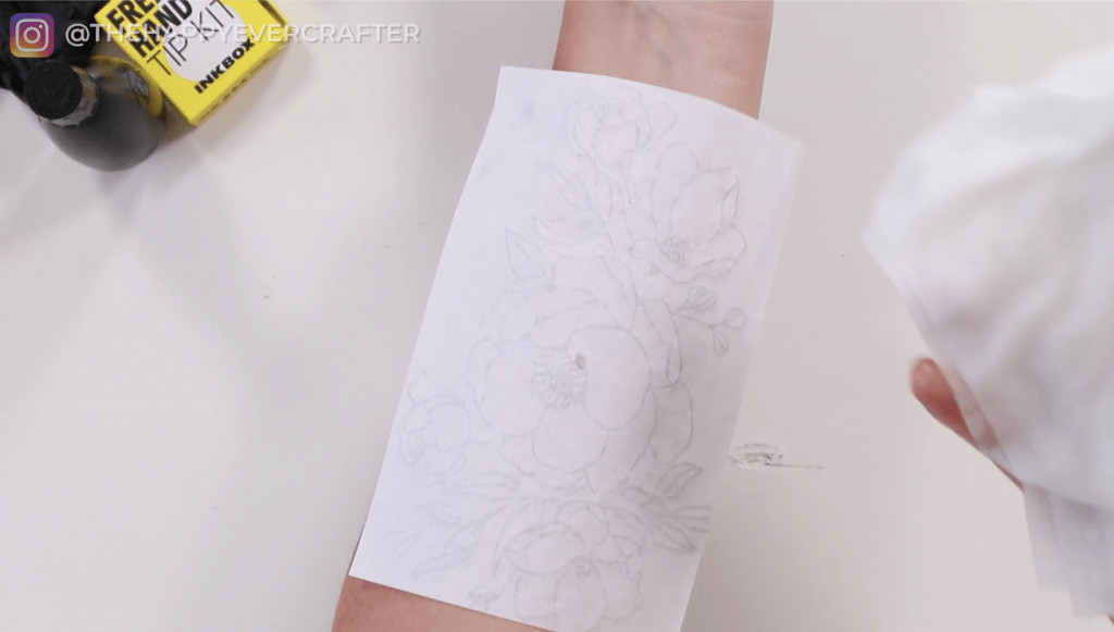 Wetting Transfer Paper on Arm