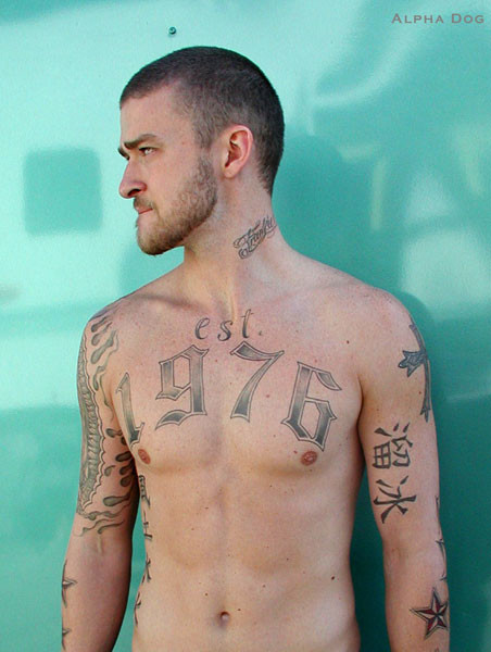 Justin Timberlake with temporary tattoos for his role in Alpha Dog, featuring the year 1976 and other designs created by SFX artist Christien Tinsley.