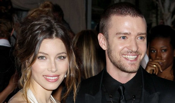Justin Timberlake with his wife Jessica Biel, sparking rumors about potential tattoos dedicated to her.