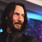 John Wick's back tattoo, Fortis Fortuna Adiuvat, meaning Fortune Favors the Bold