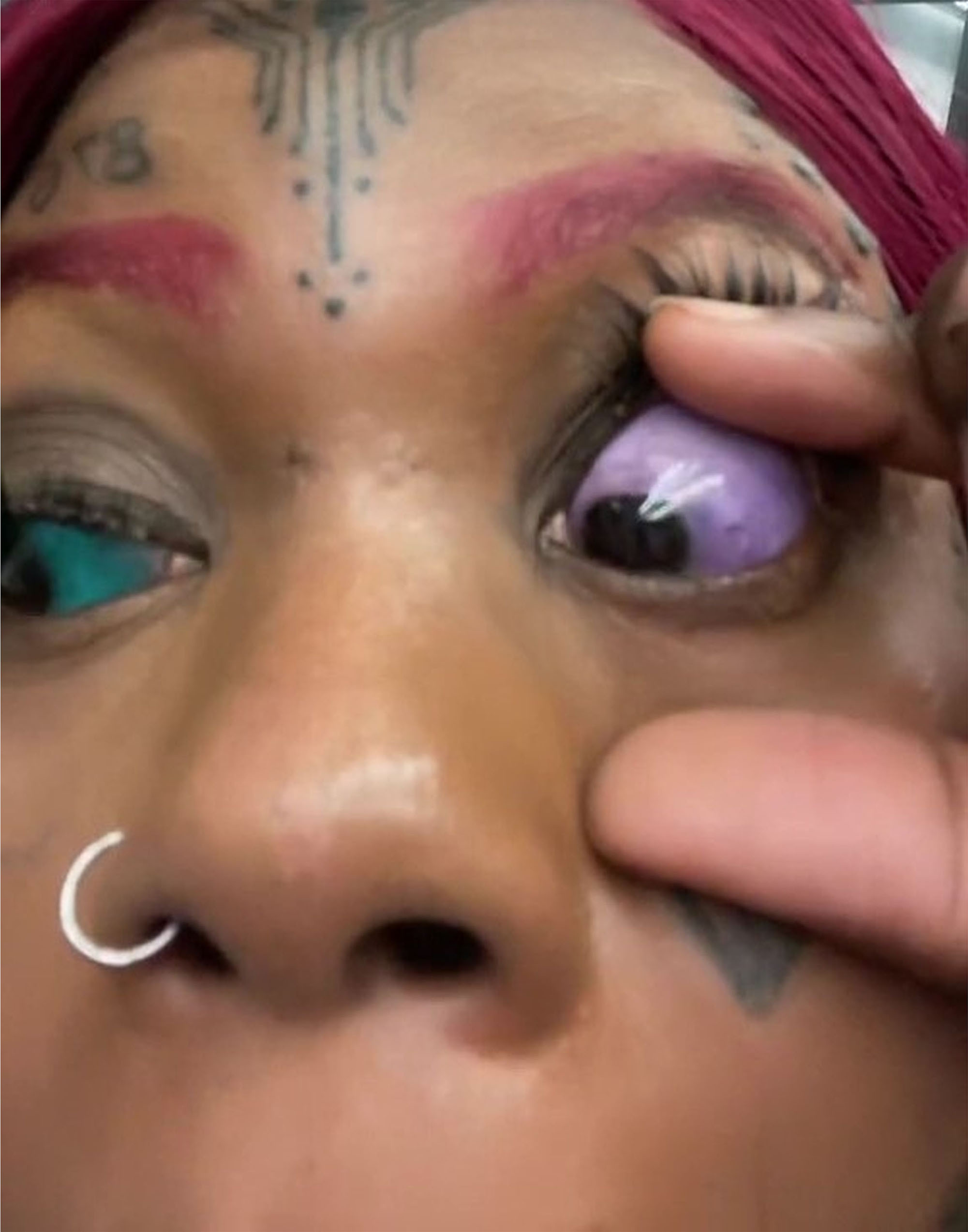 Purple eye tattoo
