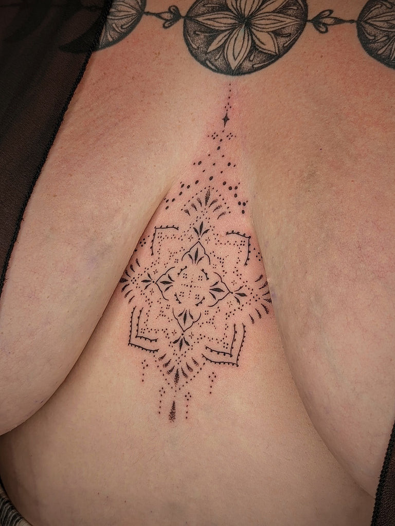 Sternum tattoo