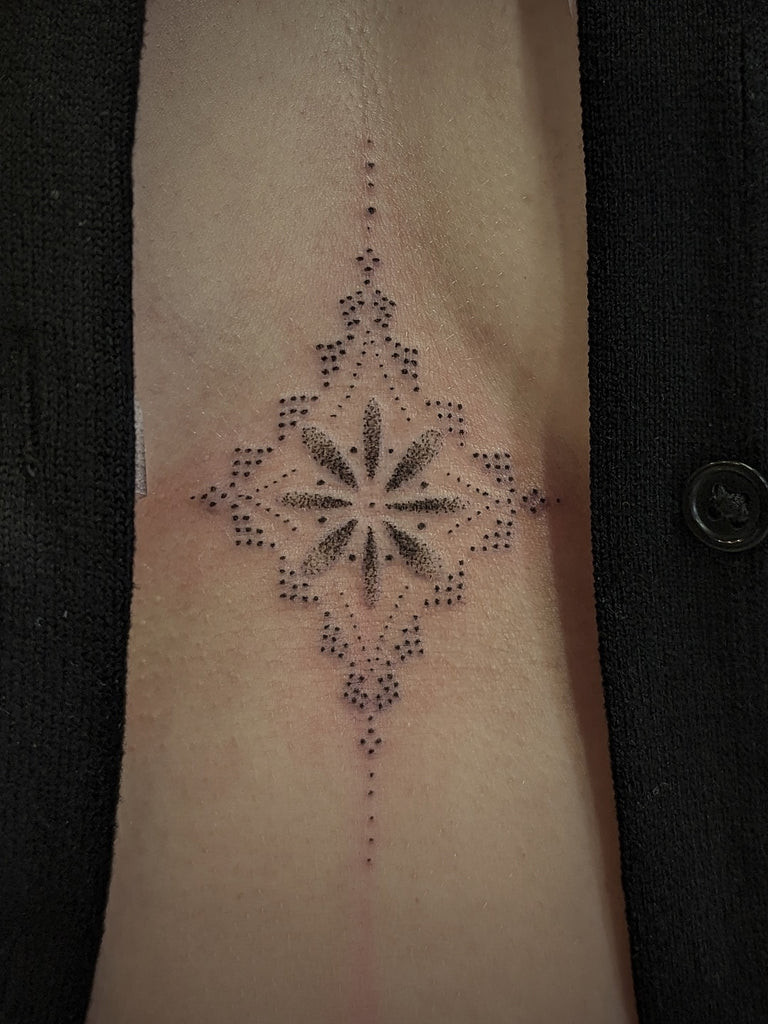 Sternum tattoo