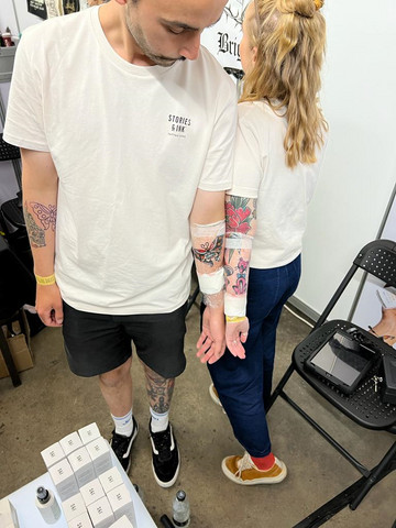 Two people tattooed at Leeds Tattoo Expo