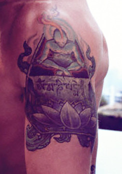 Alex O'Loughlin with a lotus tattoo