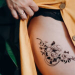 Thigh tattoo