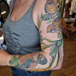 Bird sleeve tattoo