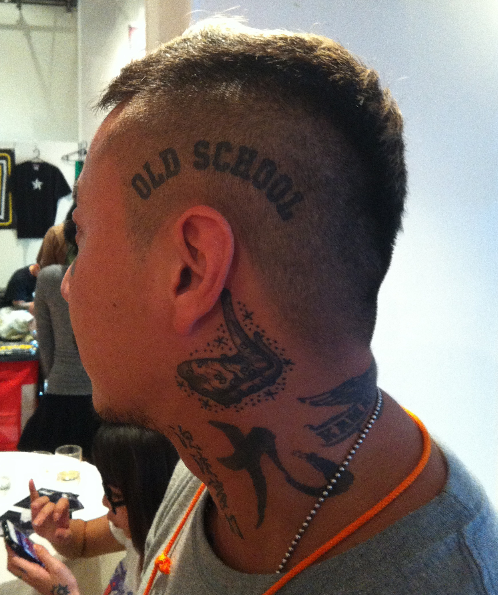 A tattooed attendee of the King of Tattoo event in Japan