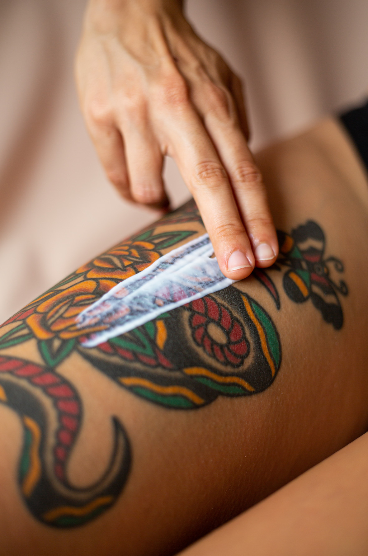 Example of different tattoos, highlighting the variety of styles and color